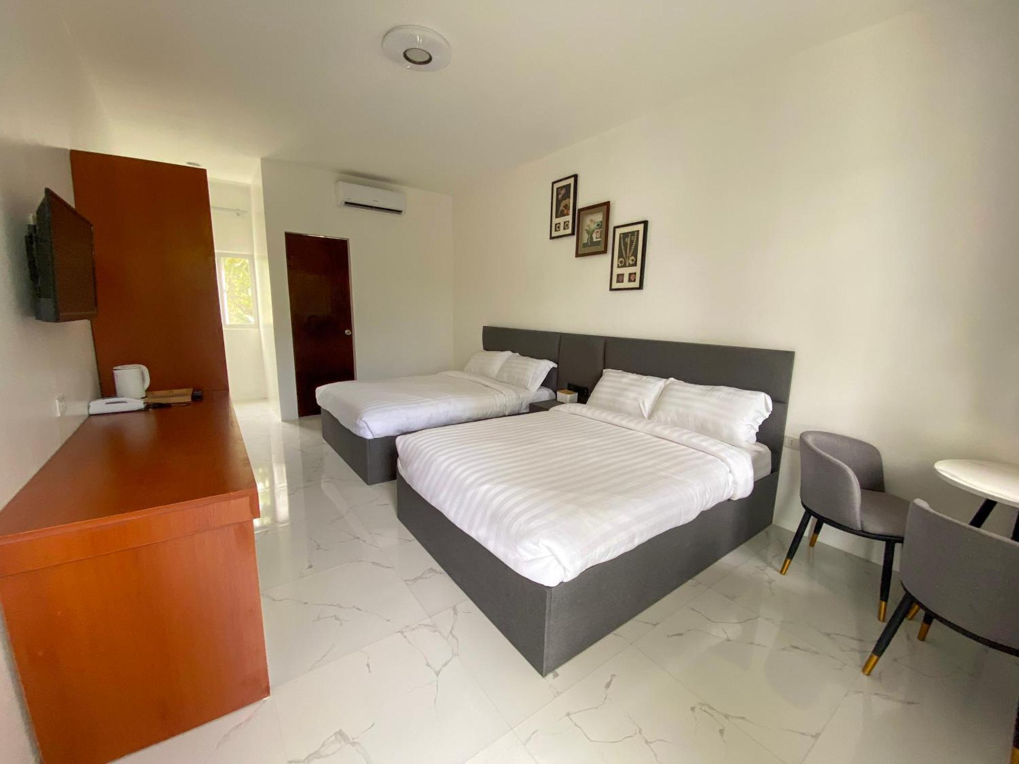 Q Beach Resort Cabangan Chambre photo