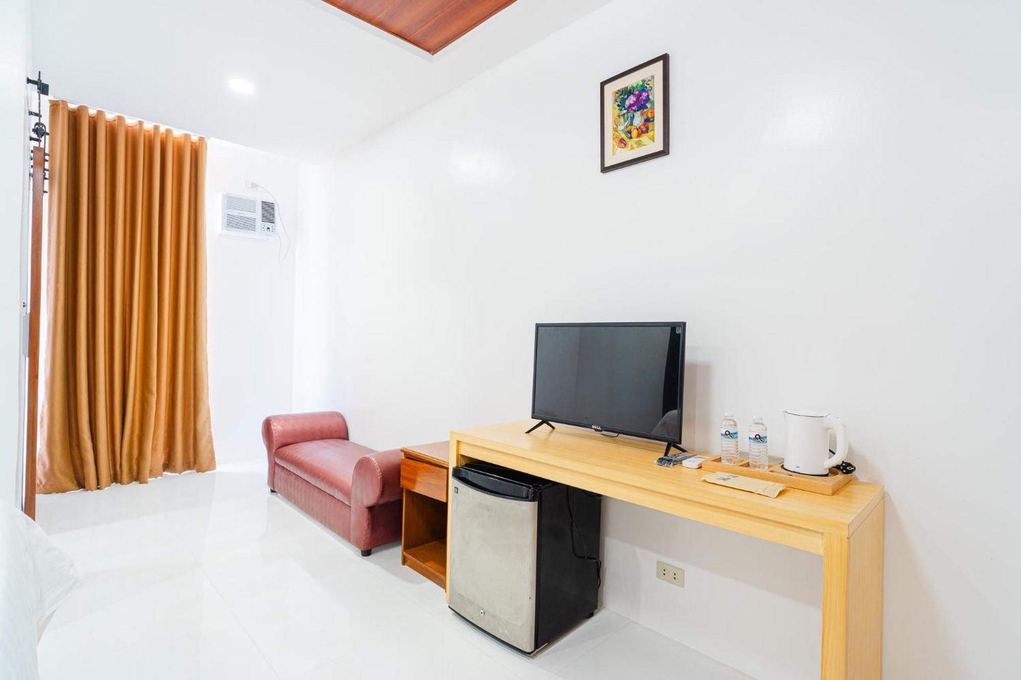Q Beach Resort Cabangan Chambre photo